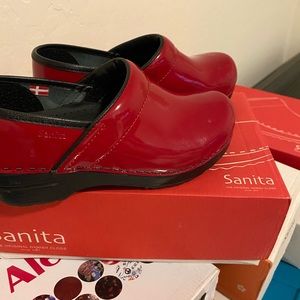 Red Sanita clogs